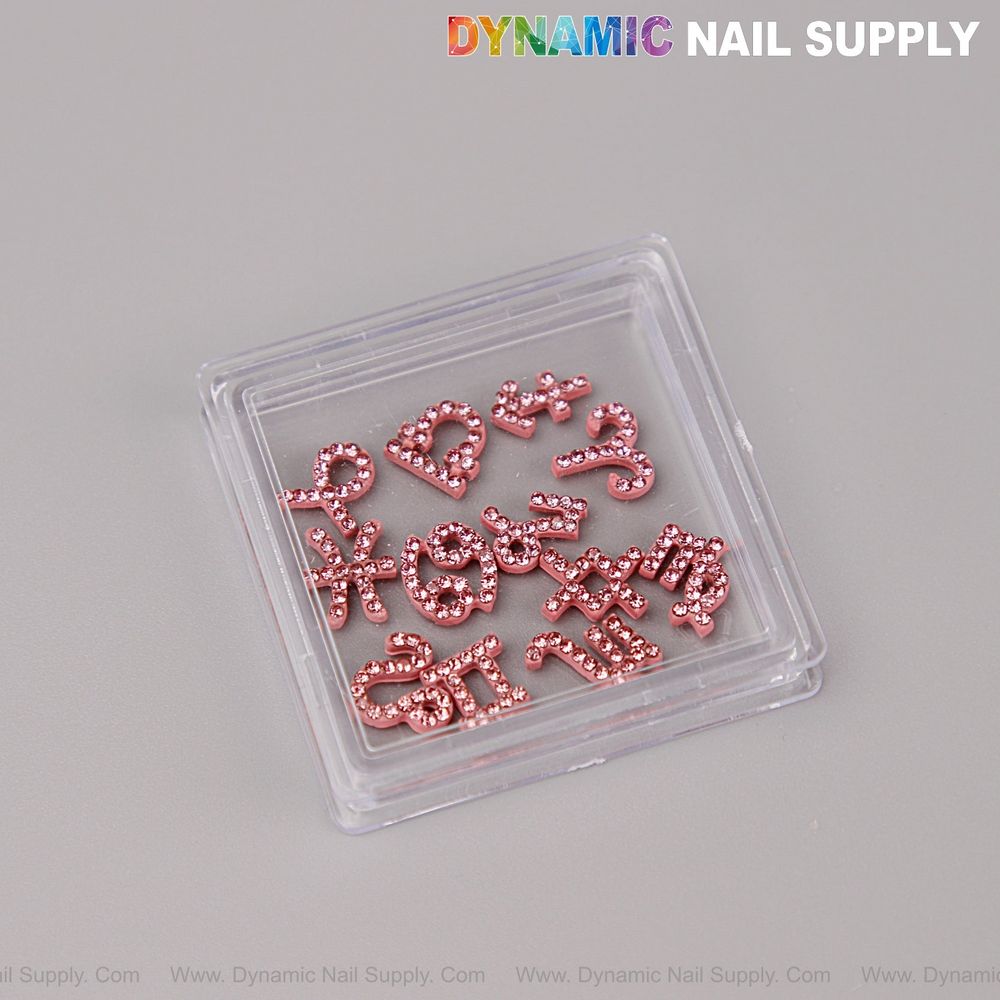 Guía práctica: charms zodiacales rosa para uñas